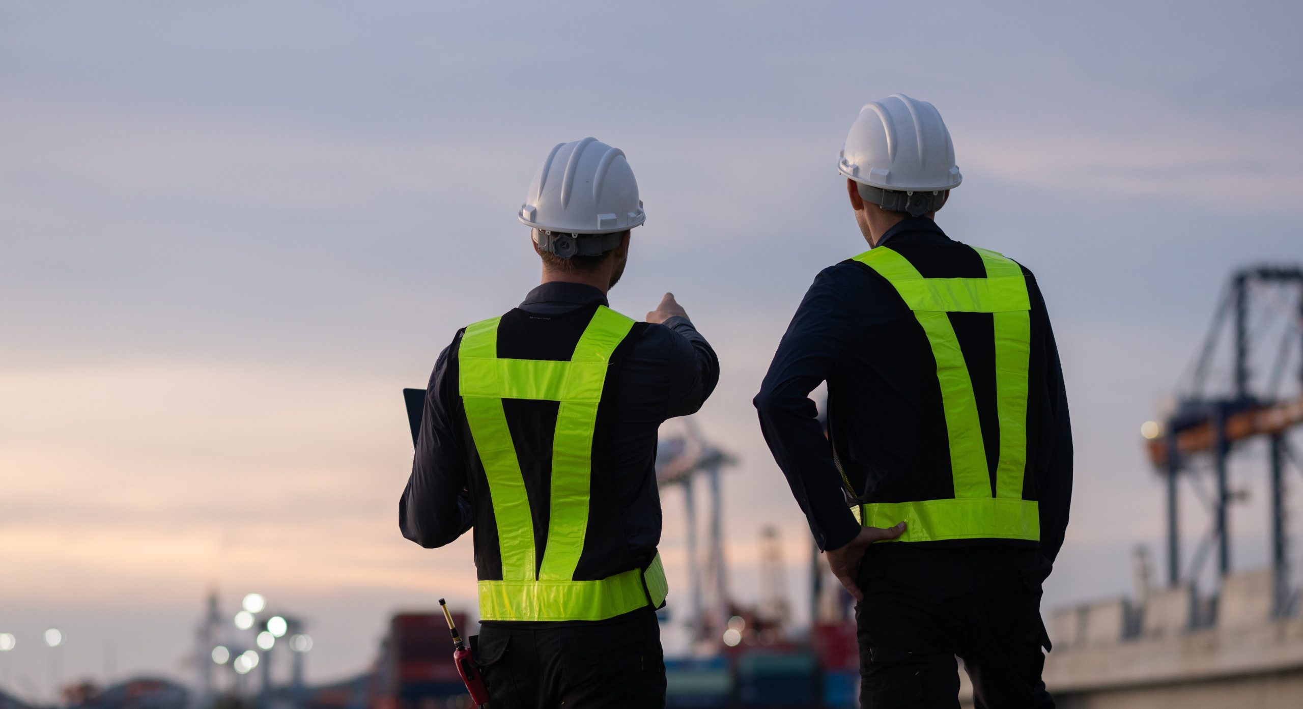 Site engineers evaluating port activity to support operational intelligence and real-time infrastructure planning