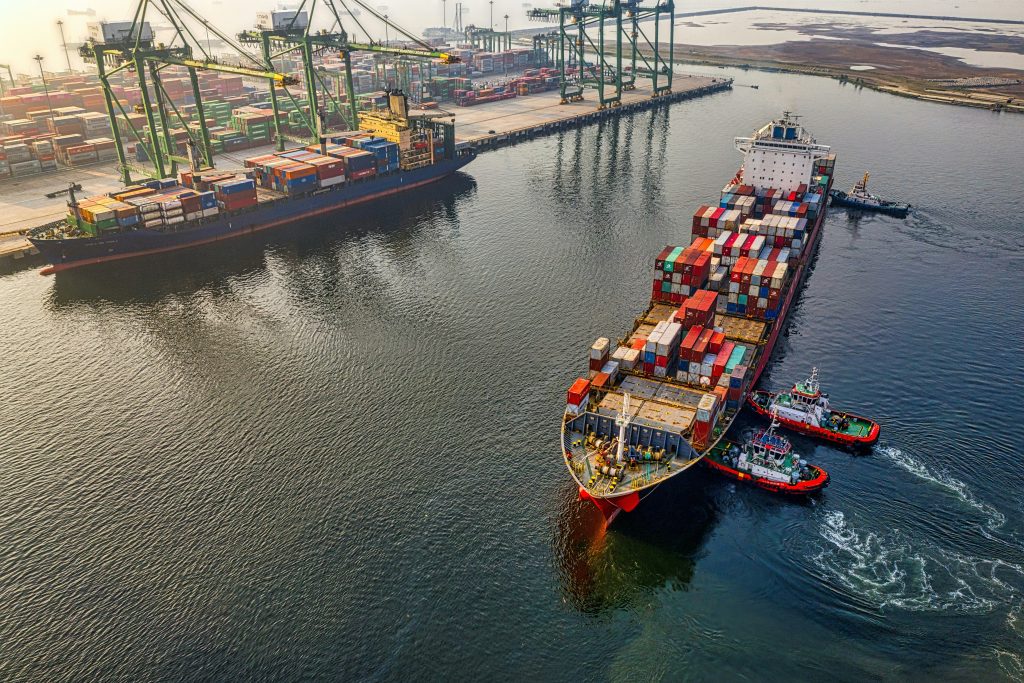 Two container ships on a port.